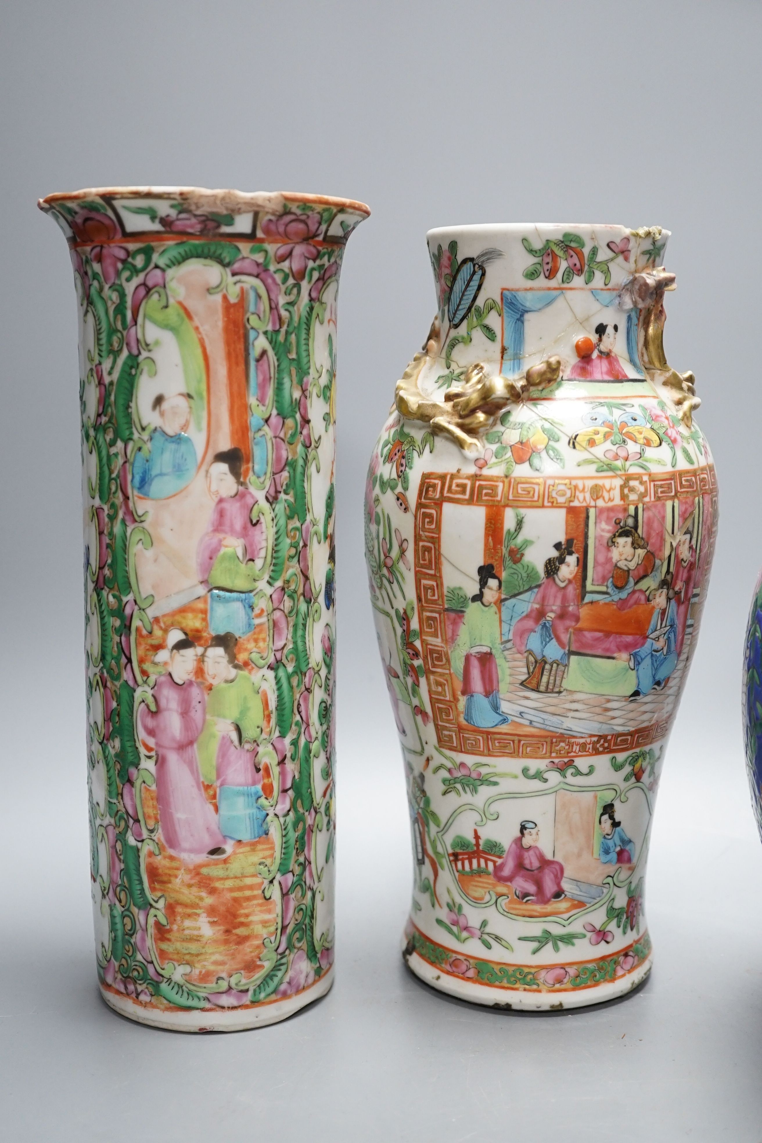 Two Chinese famille rose vases, two Chinese famille rose teapots and a blue ground enamelled jar tallest 26.5cm